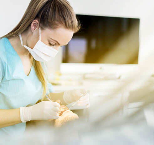 dental technicial working on patient